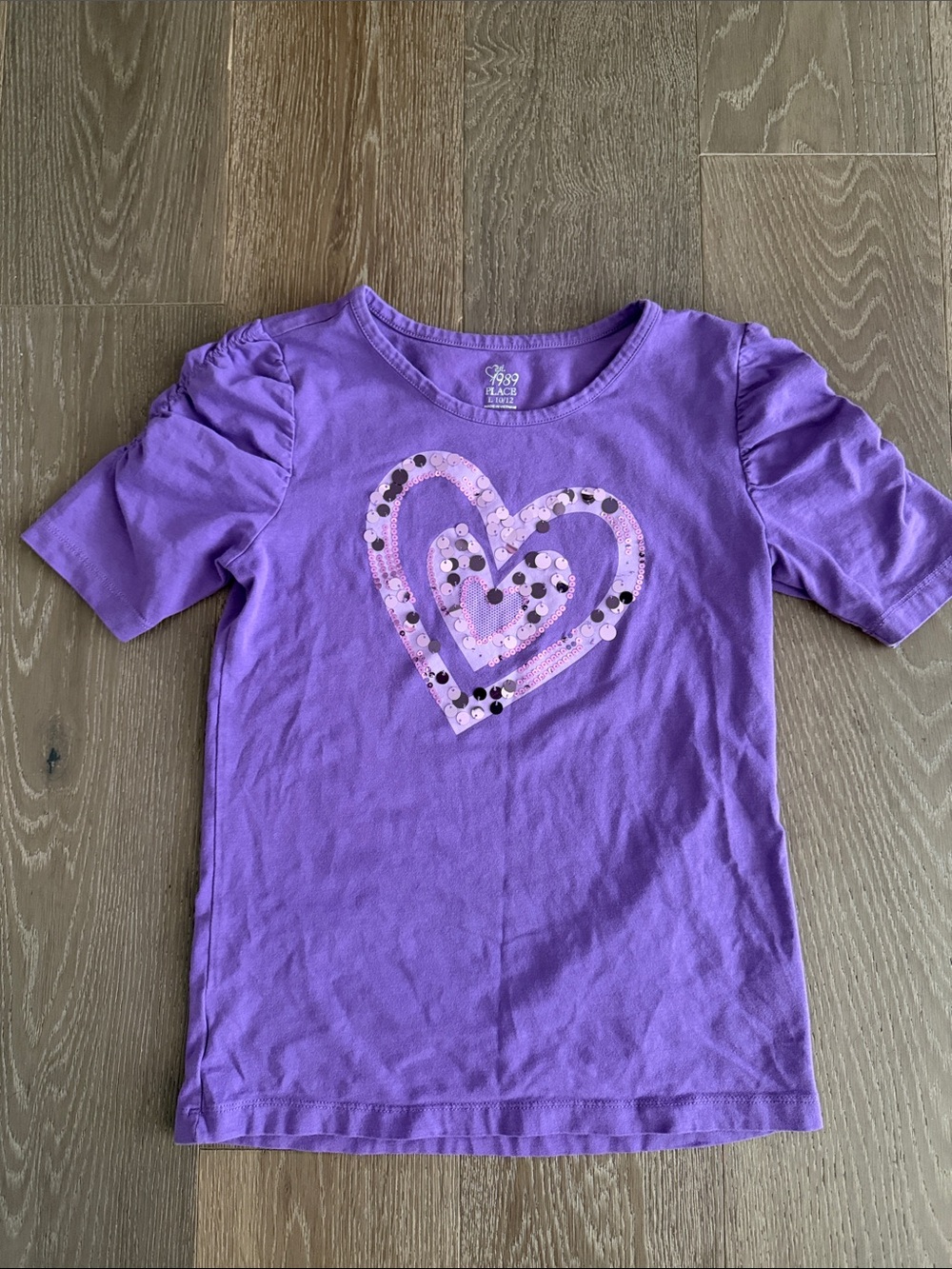 Girls 1989 Place Purple Heart sequin shirt. Size L(10/12). Gently Used.
